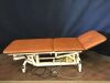 AKRON THERAPY PRODUCTS Power Plinth 3 SECTION Treatment Table:  Includes: foot switch and power supply. Range of motion is complete and smooth.
(rehab
