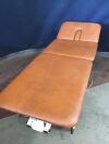 AKRON THERAPY PRODUCTS Power Plinth 3 SECTION Treatment Table:  Includes: foot switch and power supply. Range of motion is complete and smooth.
(rehab