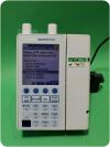 BAXTER Sigma Spectrum Infusion Pump (Version: 8.00.04) w/ Pole Clamp & Adapter