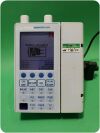 BAXTER Sigma Spectrum Infusion Pump (Version: 8.00.04) w/ Pole Clamp & Adapter