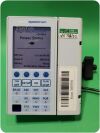 BAXTER Sigma Spectrum Infusion Pump (Version: 8.00.05) w/ Pole Clamp & Adapter