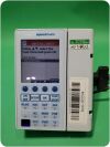BAXTER Sigma Spectrum Infusion Pump (Version: 8.00.05) w/ Pole Clamp & Adapter