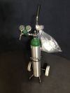 CHEMTRON Oxygen Delivery System:  Inculeds: Regulator
               Tank (empty)
               Cart
               Masks &amp; Hose