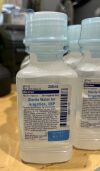 BAXTER 2F7112  STERILE WATER FOR IRRIGATION - LOT OF 10 - 250ML - EXPIRED