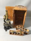 OEL-IMMERSION Antique Microscope Set:  The box and wood need to be refurbished/repaired. The brass scope appears to be intact.
Pretty cool col