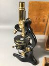 OEL-IMMERSION Antique Microscope Set:  The box and wood need to be refurbished/repaired. The brass scope appears to be intact.
Pretty cool col