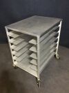  DINEX Food Tray Cart, Stainless Steel:  25 x 33 x 38hi  52lbs.
5inches in between shelves.