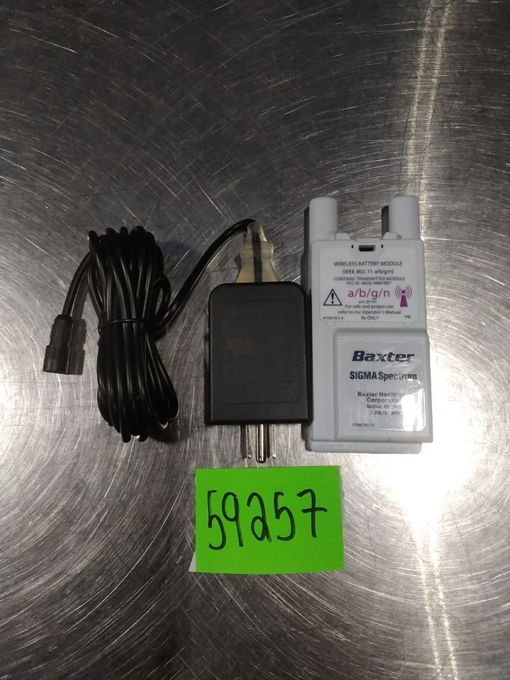BAXTER Sigma Spectrum Wireless Battery Module W/ AC/DC adapter for Pump IV Infusion