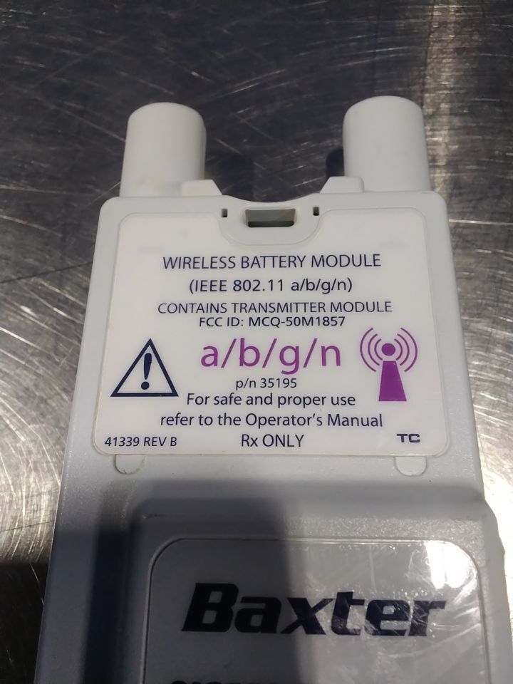 BAXTER Sigma Spectrum Wireless Battery Module W/ AC/DC adapter for Pump IV Infusion